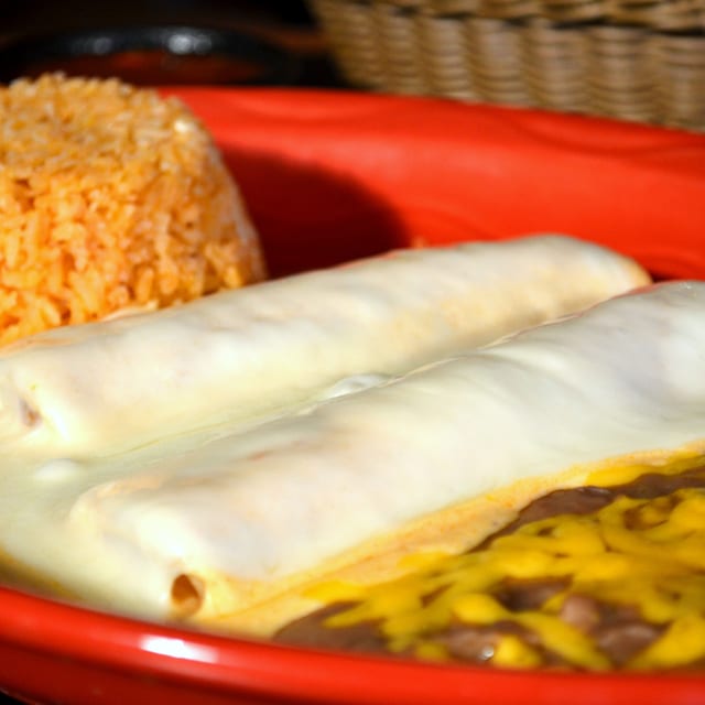 TWO ENCHILADAS A LA CREMA.
